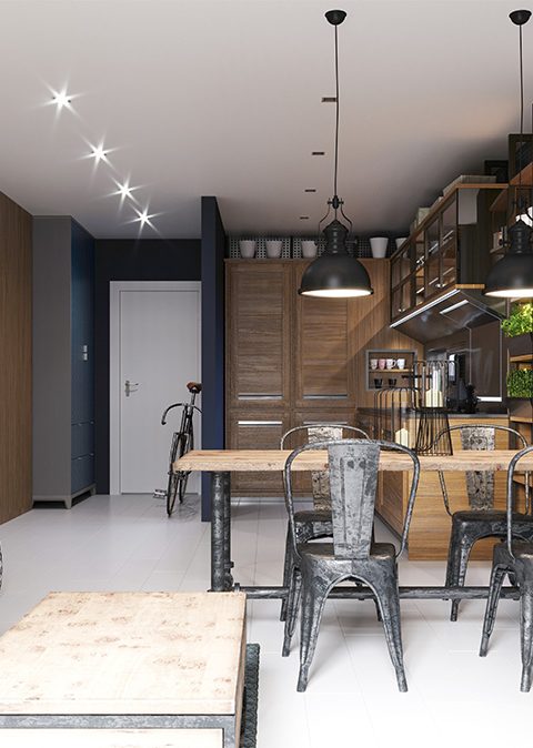 Dining area in the kitchen with deep blue walls with an iron table and chairs, in an industrial loft style.
